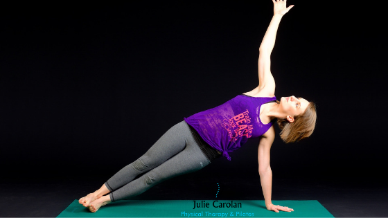Woman in pilates sidebend pose